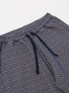 The Navy Konos Cotton Simple Short is shown from the back as a flat lay against a plain white background. The shorts feature an elasticated waistband and a single patch pocket on the right rear side. The fabric is a dark navy cotton with a subtle, textured pattern.