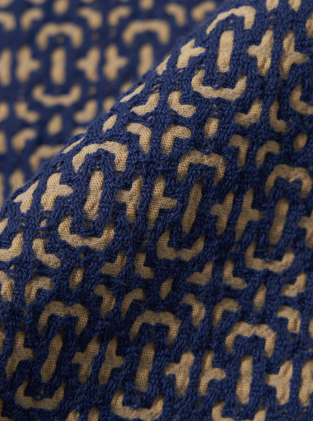A close-up swatch image of the Navy Konos Cotton Simple Short fabric. The image focuses on the textile detail, showing a deep navy blue color with a subtle, textured cotton weave pattern.