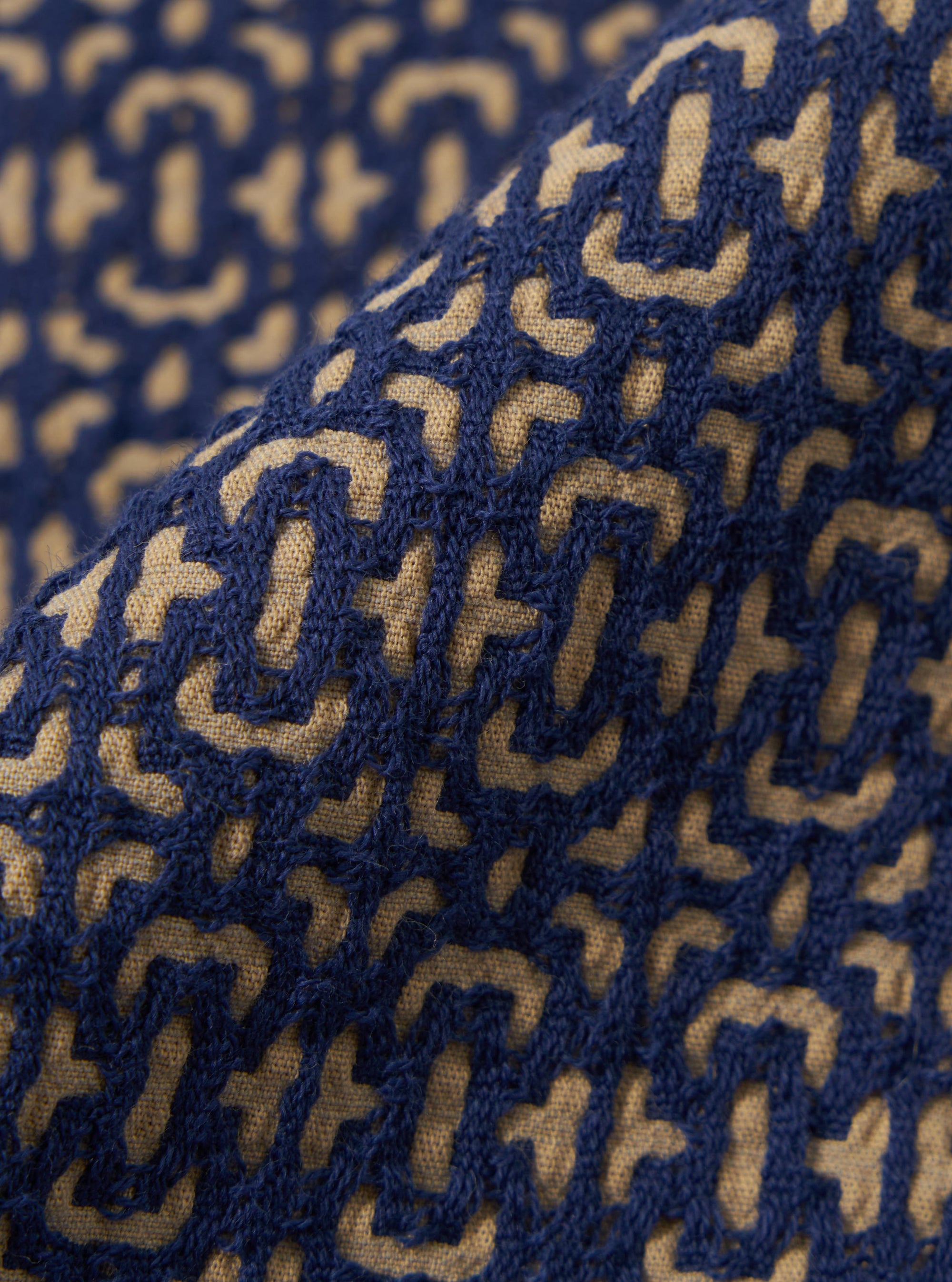 A close-up swatch image of the Navy Konos Cotton Simple Short fabric. The image focuses on the textile detail, showing a deep navy blue color with a subtle, textured cotton weave pattern.