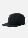 The Black Canvas Baseball Hat is shown as a flat lay against a plain white background. The hat features a structured six-panel crown, a curved brim, and a matching fabric button at the top. The black cotton canvas fabric has a visible durable texture.