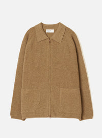 Tawny eco wool zip cardigan in camel marl, flat lay on a light grey seamless backdrop. Ribbed knit throughout with a spread collar, full-length bronze zip and two patch pockets at the hem. Ribbed cuffs and hem band. Universal Works woven label at the neckline.