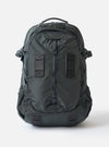 F/CE.® Grey Recycled Nylon 420 re/cor Travel Backpack on a white background. The backpack is a muted grey color and made of a durable nylon material. 