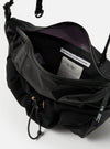Close-up of the F/CE.® Black Nylon Cordura Sil Sacoche, showcasing its open top, black nylon material, mesh details, and adjustable strap against a plain white background.