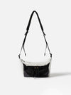 The F/CE.® White Nylon Cordura Sil Sacoche bag hangs against a white backdrop. The bag features a white nylon upper, black mesh pocket, and black straps.