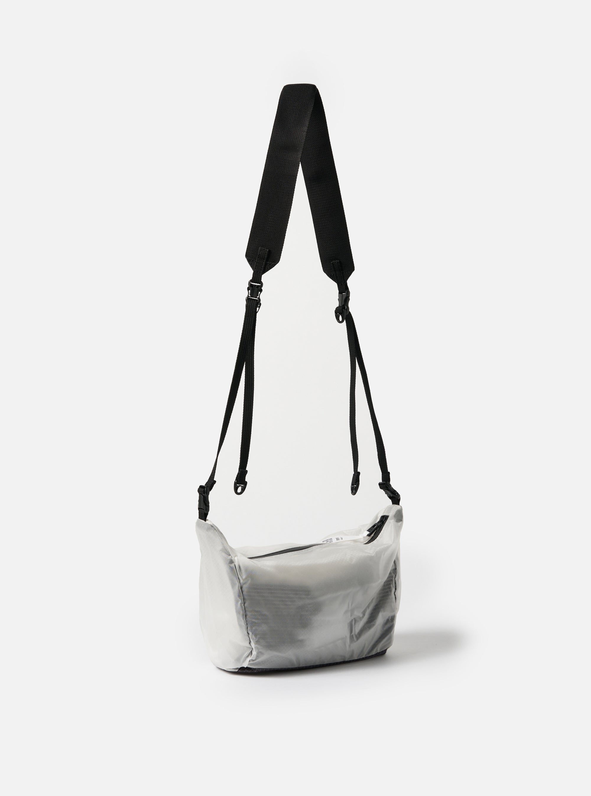 The F/CE.® White Nylon Cordura Sil Sacoche bag. It features a white nylon body, black strap, and is staged on a white background.