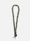 An overhead image of the Hanami of Rome Military Green/Blue Leather Bandana Necklace No.46 on a white background. The necklace is a mixture of green, blue and white in an assymetric pattern.