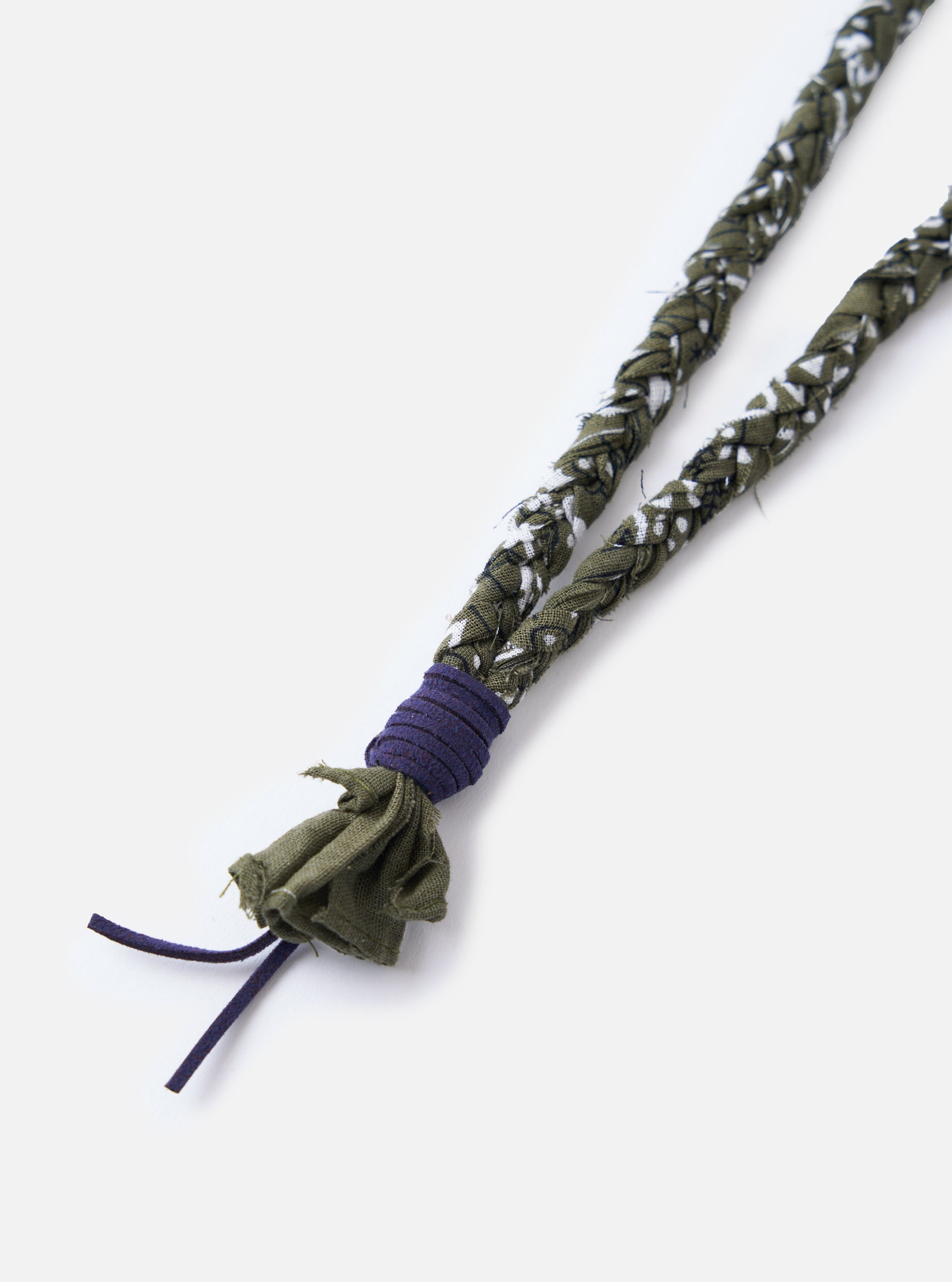 Close-up of the Hanami of Rome Military Green/Blue Leather Bandana Necklace No.46 on a white background. The necklace features a braided green and white pattern with blue leather accents.