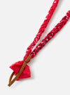 Close-up of the Hanami of Rome Red/Brown Leather Bandana Necklace No.52 on a white background. Features a braided red and white fabric and brown leather.