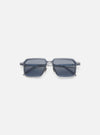 A. SOCIETY x Universal Works Silver/Grey Kowloon Eyewear on a white background. These square framed glasses have silver metal details and grey tinted lenses.