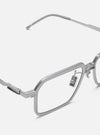 Close-up of A. SOCIETY x Universal Works Silver/Grey Kowloon Eyewear on a white background. The glasses have a square frame and silver-grey metal finish.
