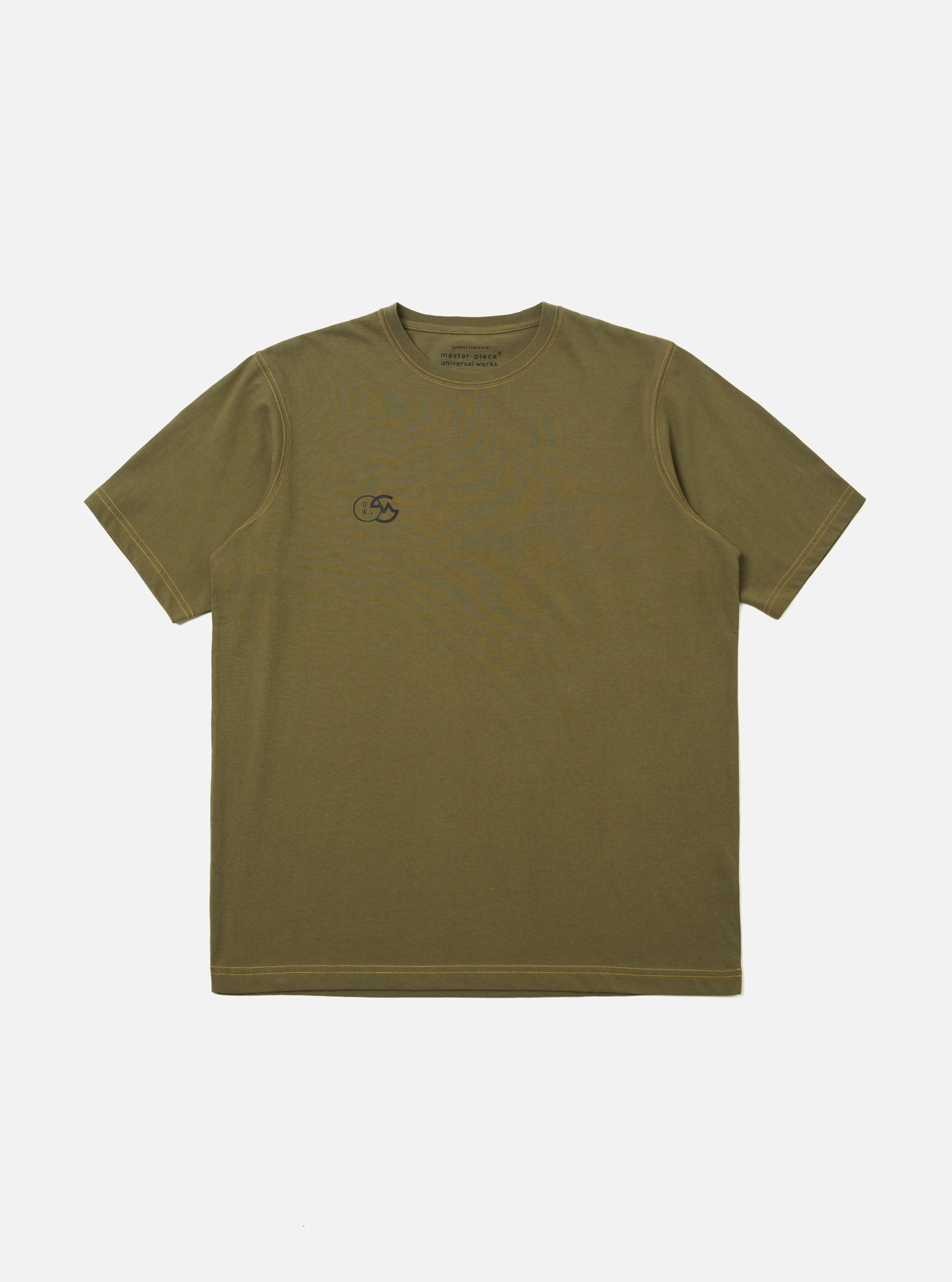 The master-piece x Universal Works Olive Single Jersey Print Tee is shown as a flat lay against a white background. The olive green short-sleeved t-shirt features a small graphic print on the left chest and a larger matching graphic print on the back. The garment has a ribbed crew neck and a straight hem.
