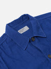 Close-up of the Work Blue Summer Cord Tech Overshirt on a white background. The blue corduroy texture and button details are clearly visible.