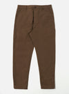 Studio shot of Khaki Linen Slub Weave Military Chino pants in brown on a white background. The pants are neatly arranged, showcasing their fit and material.