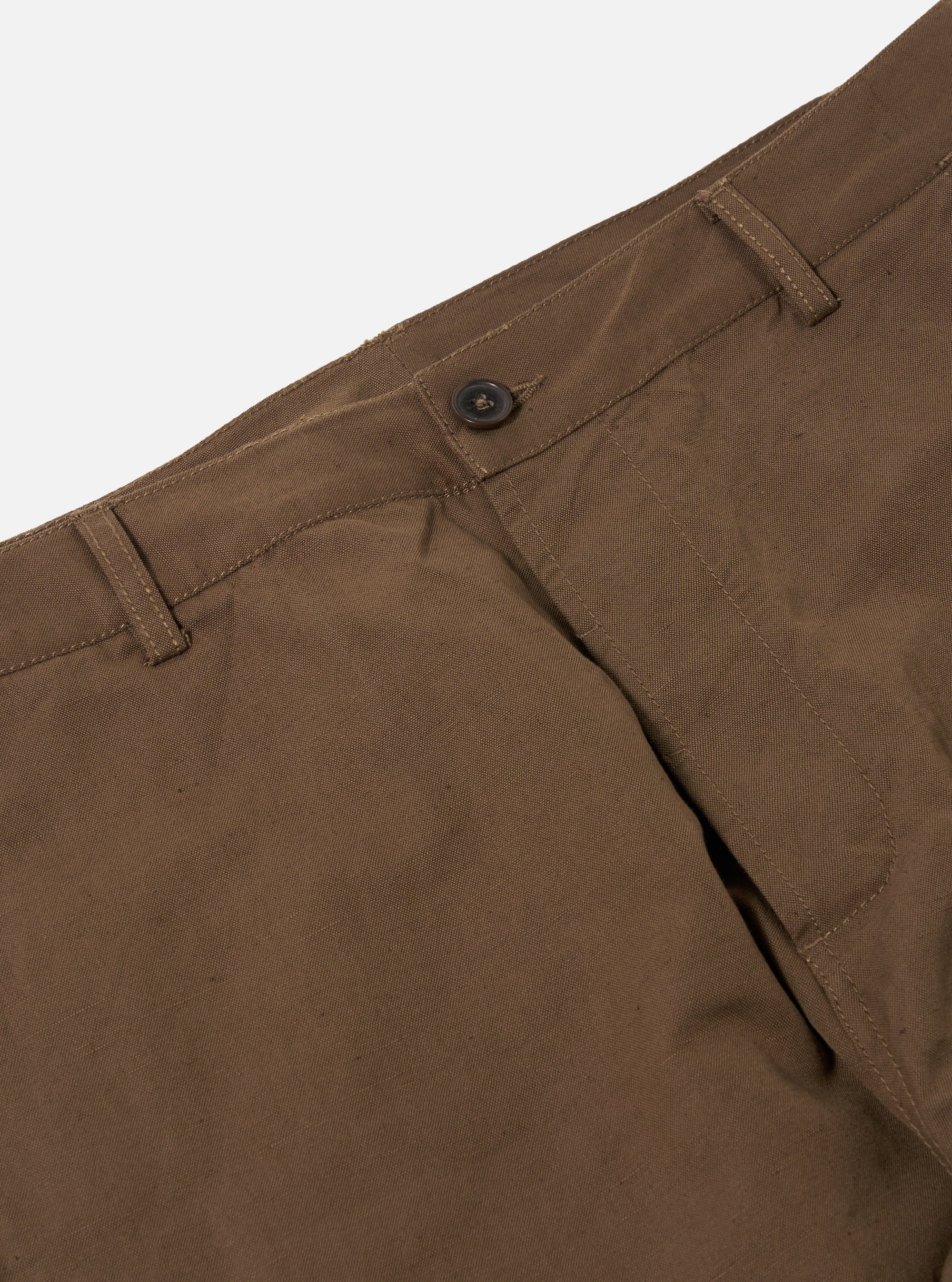 Close-up of Khaki Linen Slub Weave Military Chino pants on a white background. Details include the button, belt loops, and pocket. The fabric has a subtle texture.