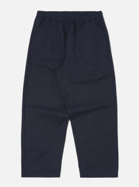 Studio shot of the Navy Military Cotton Judo Pant on a white background. These loose-fitting, navy cotton pants feature an elastic waist with a drawstring.