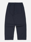 Back view of the Navy Military Cotton Judo Pant on a white background. The pants are a relaxed fit with an elastic waistband and two back pockets.