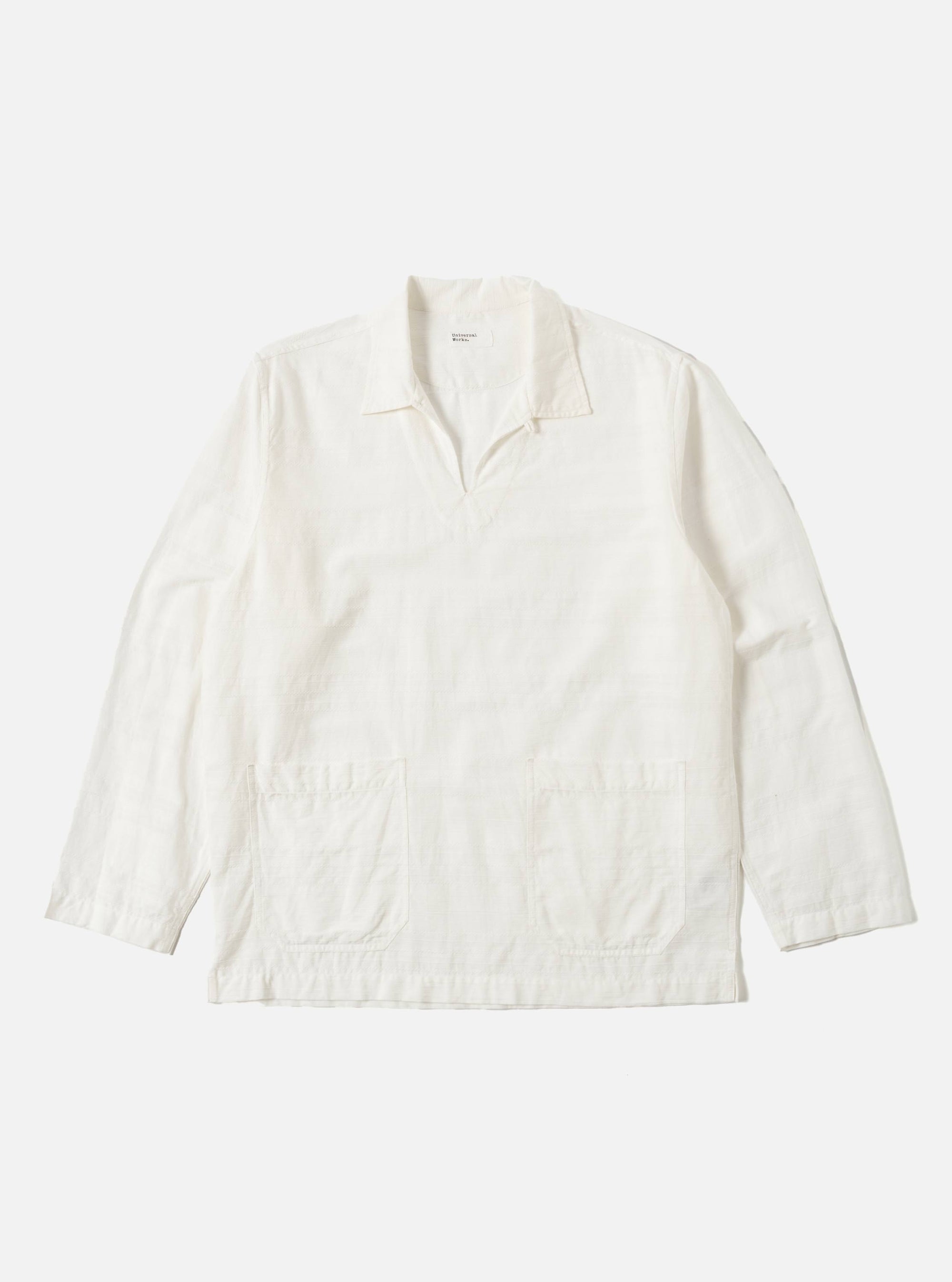 The Ecru Deffe Self Stripe Smock Overshirt in off-white, laid flat on a white background. The shirt has long sleeves, a v-neck, and two front pockets.