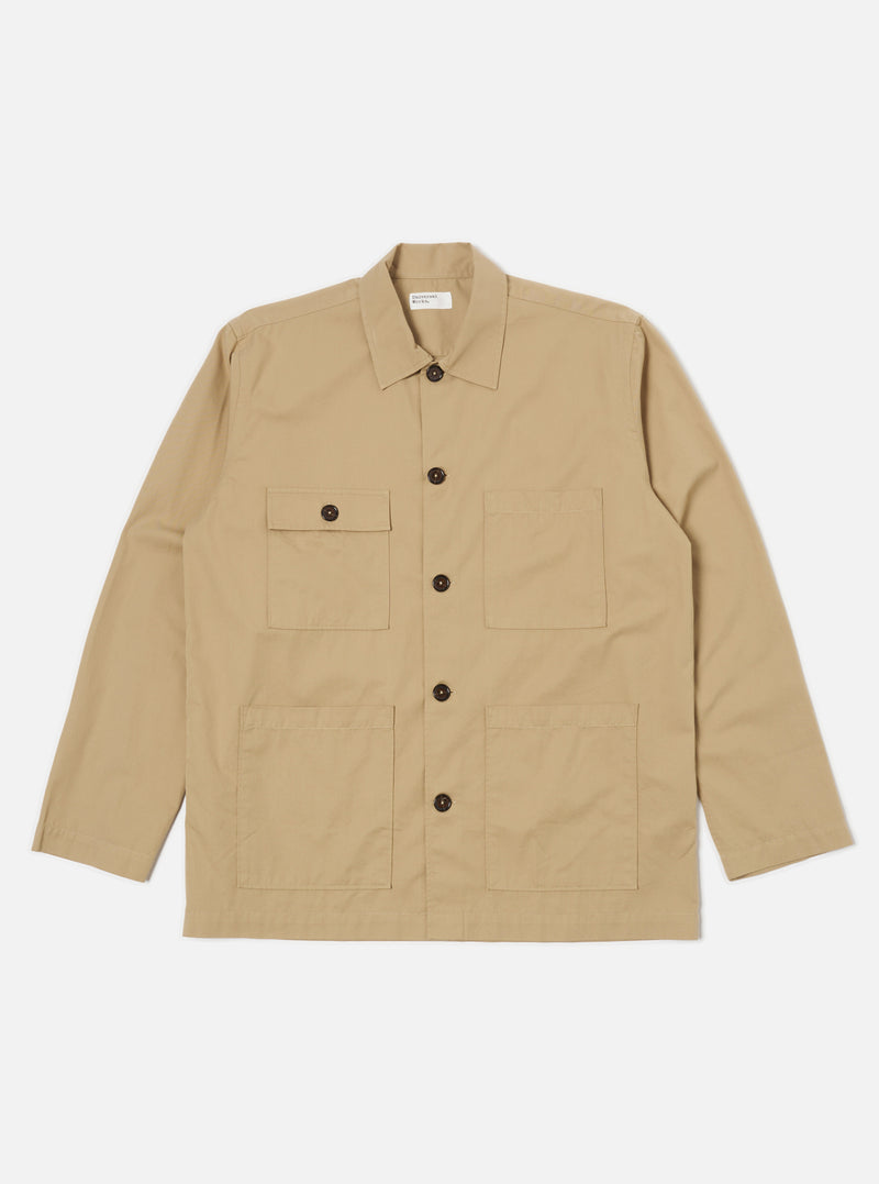 The Sand Military Cotton Dockside Overshirt in sand color. Made from cotton, it features a relaxed fit. Shot on a clean white background.