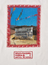 Close-up of the Ecru/Red Single Jersey Pickup Print Tee. The tee features a red floral frame around a print of a building with flags. The brand logo is printed below.