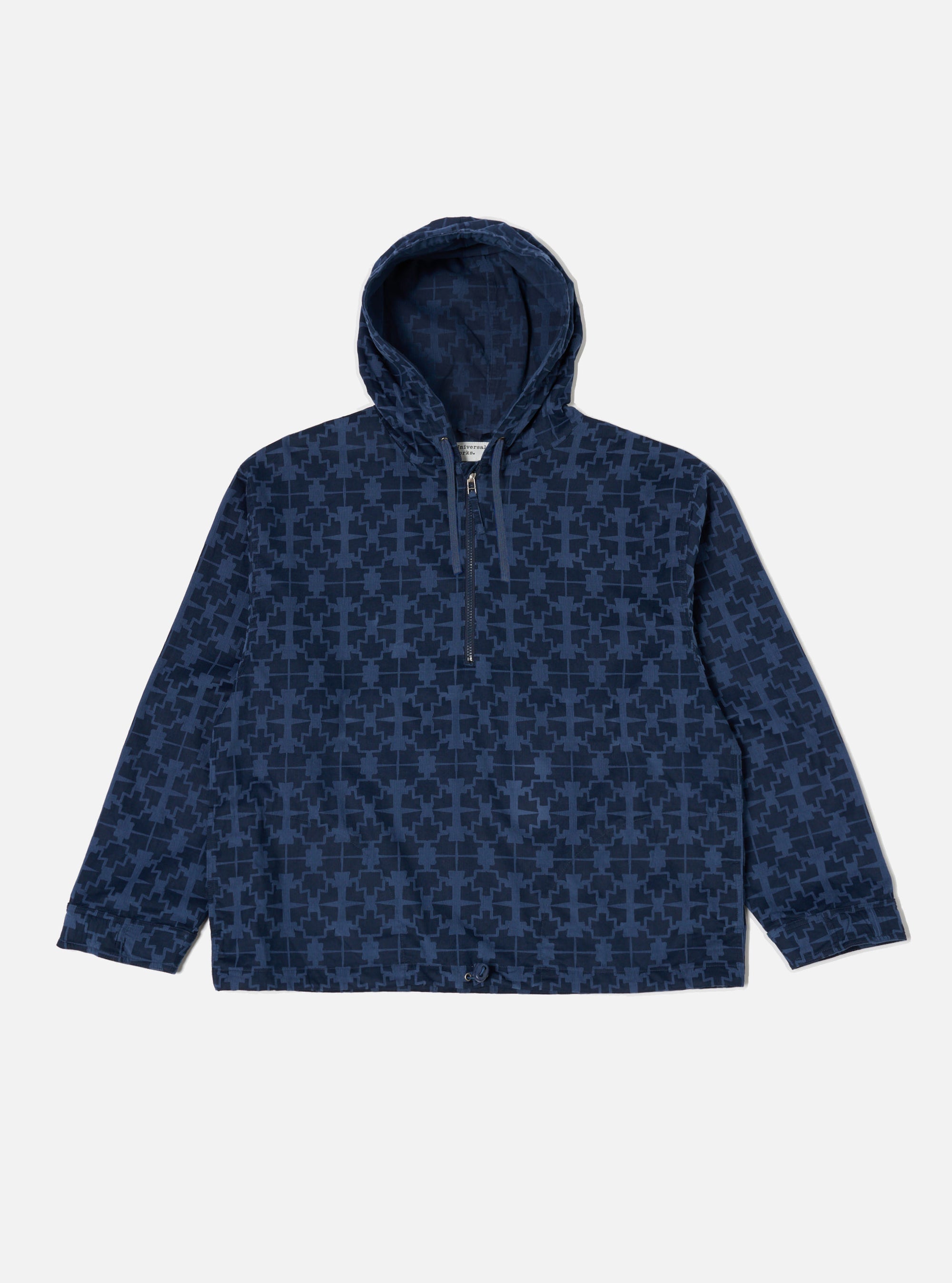 The Navy Mitla Print Cord Liam Jacket, a blue corduroy hooded jacket with a geometric print, is laid flat on a white background.