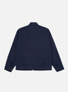 The Navy Linen Slub Weave E130 Jacket is shown from the back, laid flat against a solid white background. The image highlights the textured linen-cotton fabric, the straight hem, and the clean stitching along the shoulders and sleeves.
