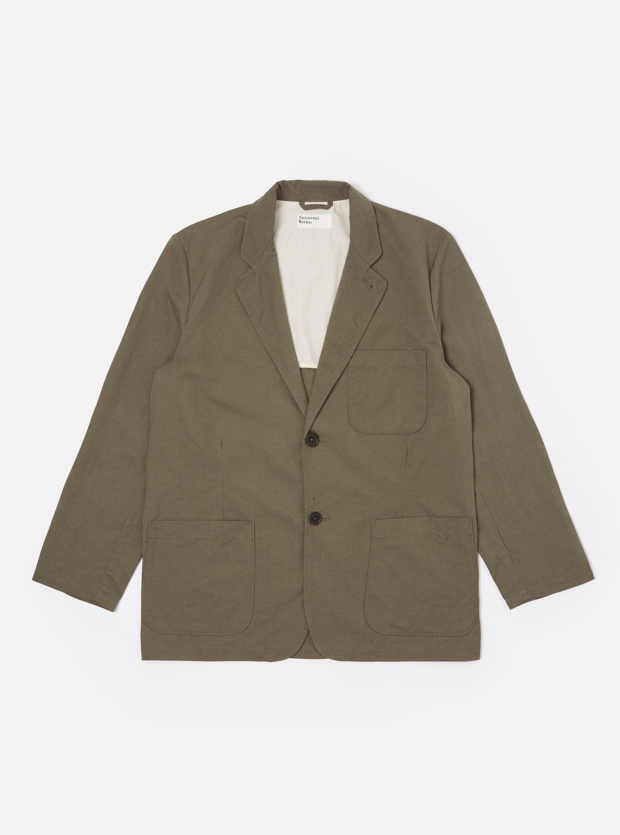 The Olive Linen Slub Weave Two Button Jacket is shown as a flat lay against a plain white background. The jacket features a relaxed fit with a two-button front closure, a long and wide notch lapel, two lower patch pockets, and one chest patch pocket. The olive green fabric has a visible slubby texture.