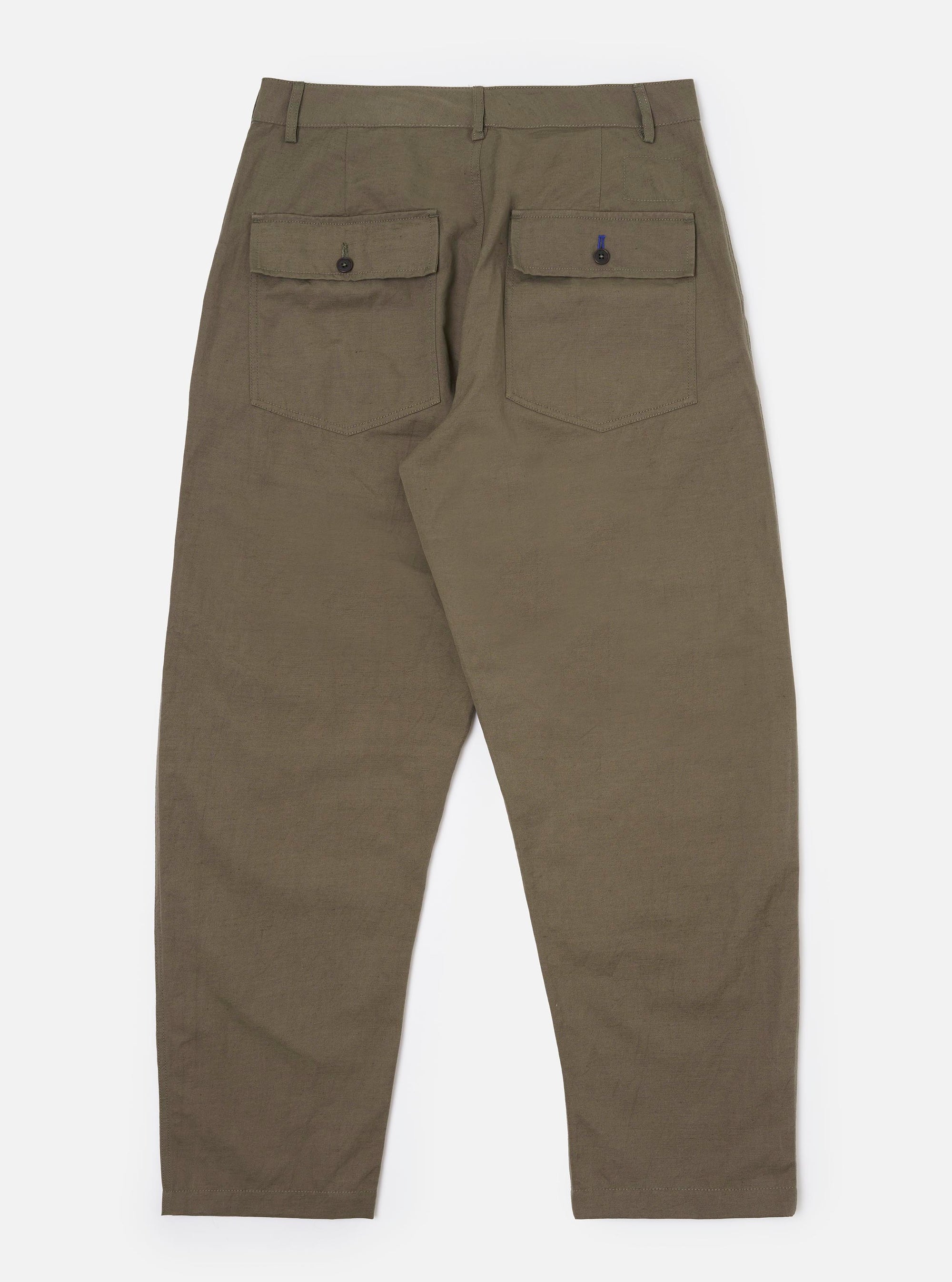 The Olive Linen Slub Weave Dizzy Trouser is shown from the back, laid flat against a plain white background. The image highlights the two large rear patch pockets, the wide-leg silhouette, and the textured, slubby weave of the olive green linen-blend fabric.