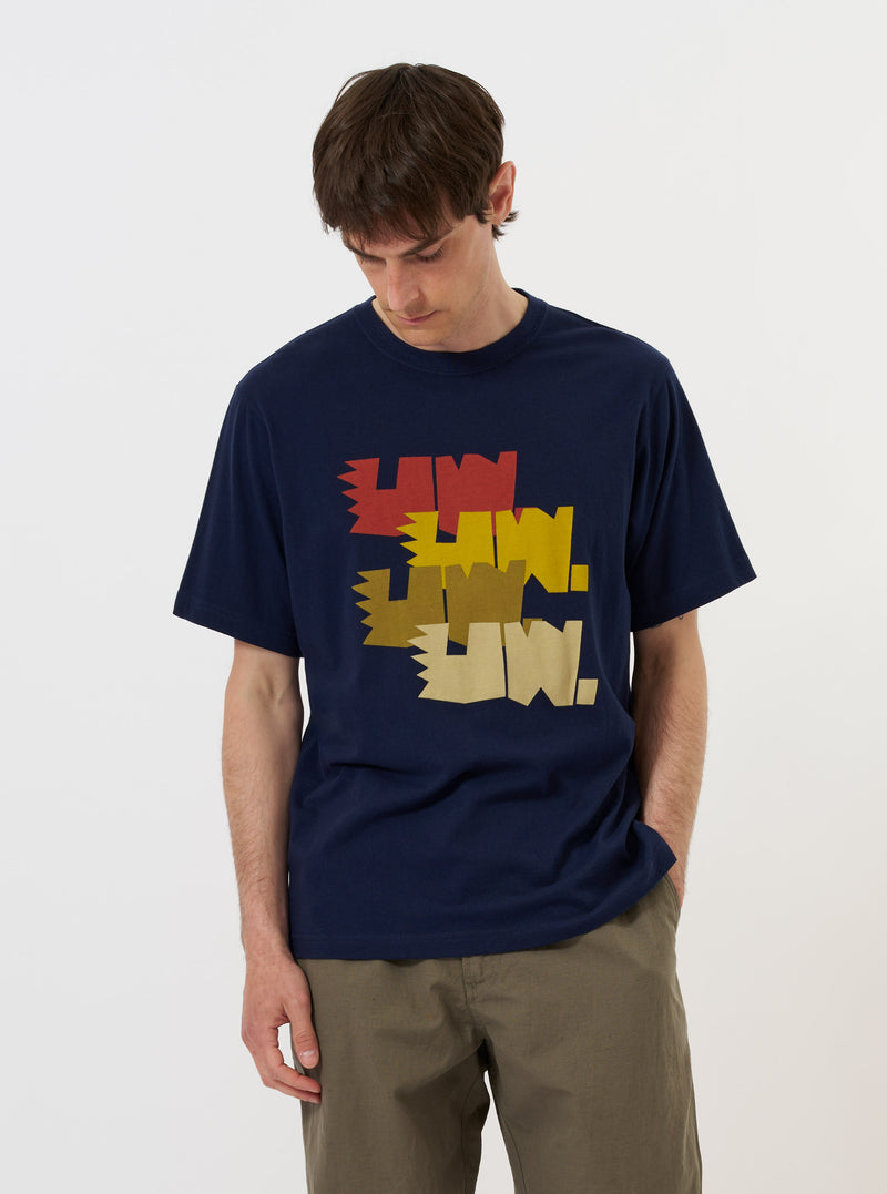 The Navy Single Jersey Multi UW Print Tee is shown laid flat against a plain white background. The navy blue t-shirt features a classic crew neck, short sleeves, and a repeating white UW graphic print across the entire garment.