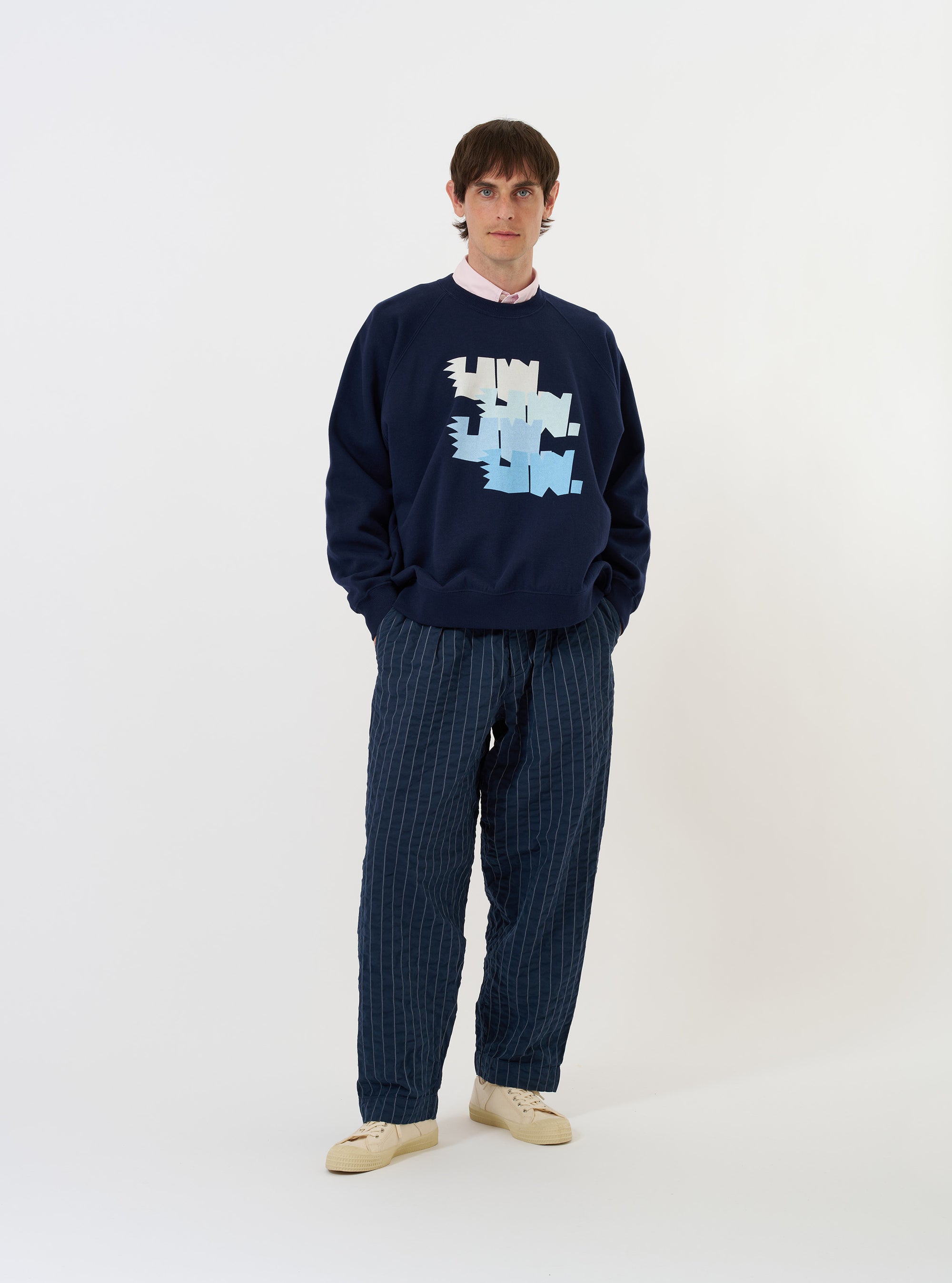 The Navy Brush Back Sweat FM Raglan Sweatshirt is shown laid flat against a solid white background. The navy blue garment features a classic crew neckline, long raglan sleeves, and ribbed detailing at the collar, cuffs, and hem.