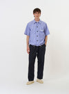 The Blue/White Cotton Stripe Z Tech Overshirt is shown laid flat against a plain white background. The garment features vertical blue and white stripes, a classic pointed collar, a full button-down front, and two large utility chest pockets.