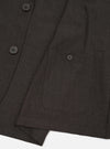 The Brown Marl Tropical Suiting Two Button Jacket is shown from the back, laid flat against a plain white background. The image highlights the clean construction of the shoulders, the central seam, and the straight hem of the garment.