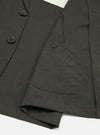 The Olive Marl Tropical Suiting Two Button Jacket is shown from a rear perspective, laid flat against a solid white background. The image highlights the unstructured, clean design of the back, the two-piece sleeve construction, and the subtle texture of the olive marl wool-blend fabric.
