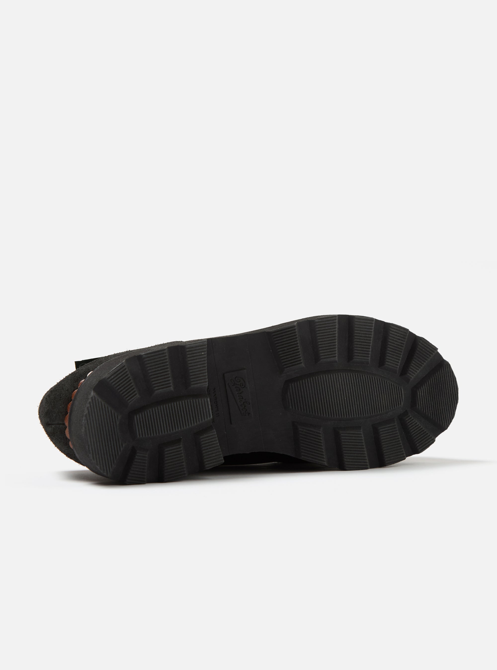 Close-up of the sole of the Paraboot x Universal Works Michael in Black Leather/Suede, showcasing its thick tread. Shot on a clean white background.