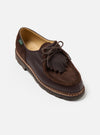 Close-up of Paraboot x Universal Works Michael in Coffee Leather/Suede shoe on a white background. Features dark brown leather and suede, with a fringed detail and lace-up closure.