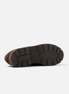 Close-up of the sole of the Paraboot x Universal Works Michael in Coffee Leather/Suede shoe on a white background, showcasing its lugged design and construction.