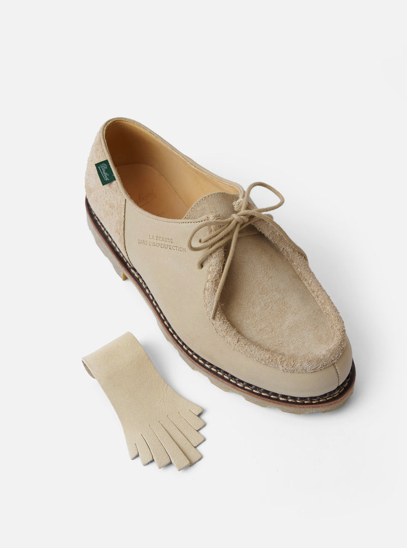 Paraboot x Universal Works Michael in Sand Leather/Suede shoe on a white background. Features sand suede and leather, with a fringed leather piece. 