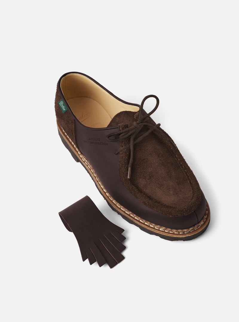 Close-up of the Paraboot x Universal Works Michael in Coffee Leather/Suede on a white background. The shoe features brown leather and suede, with a fringed leather accent.