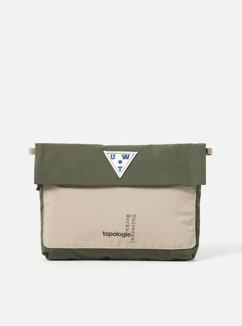 Topologie x Universal Works Rifle Green UW Tech Musette Medium bag in rifle green and beige on a white background. The bag features the Topologie and Universal Works logos.