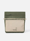 The Topologie x Universal Works Rifle Green UW Tech Musette Medium bag on a white background. The bag is green with a beige pocket and beige strap.