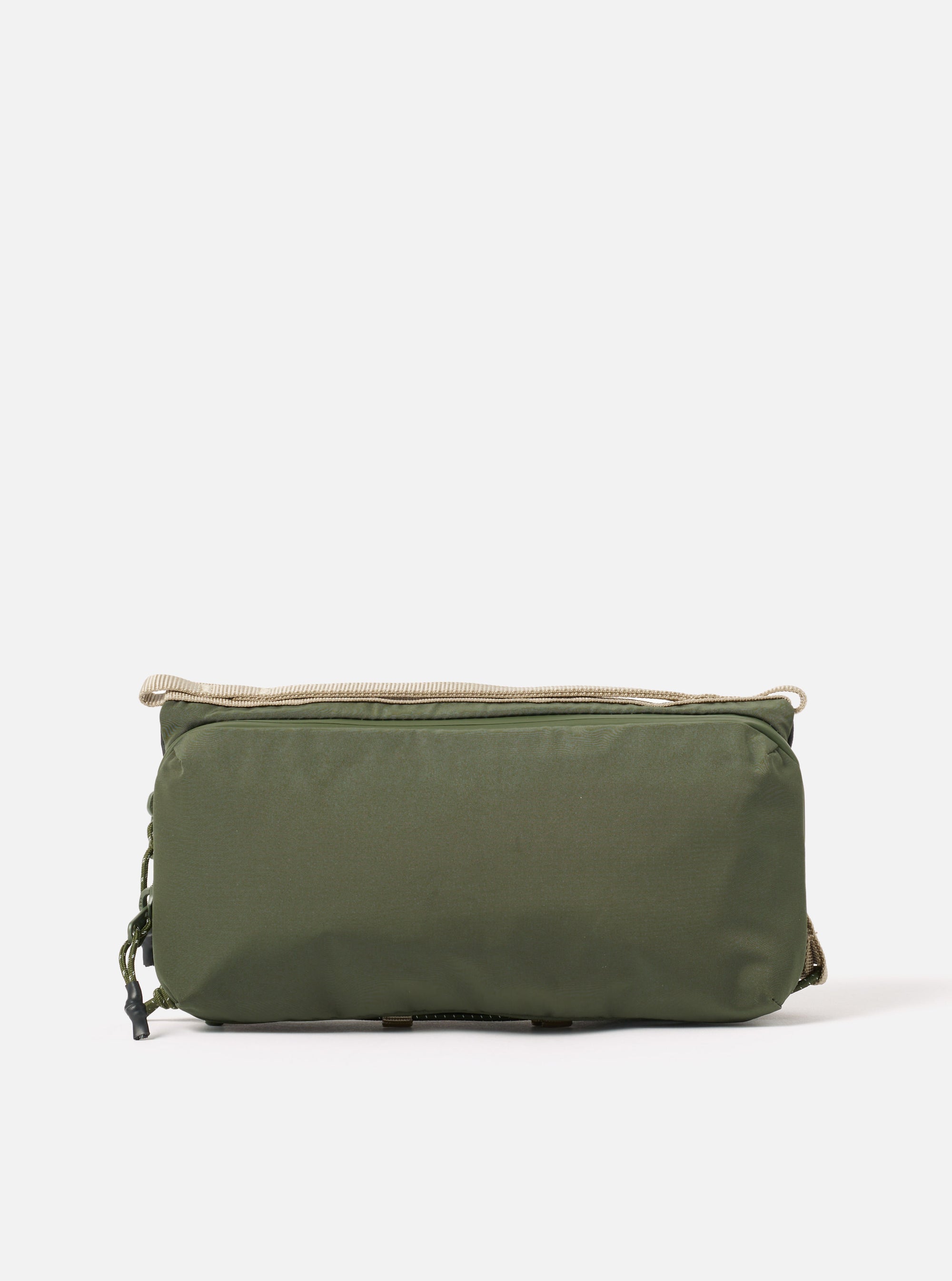 The Topologie x Universal Works Rifle Green UW Tech Bottle Sacoche Medium on a white background. The sacoche is rifle green with beige straps and drawstrings.