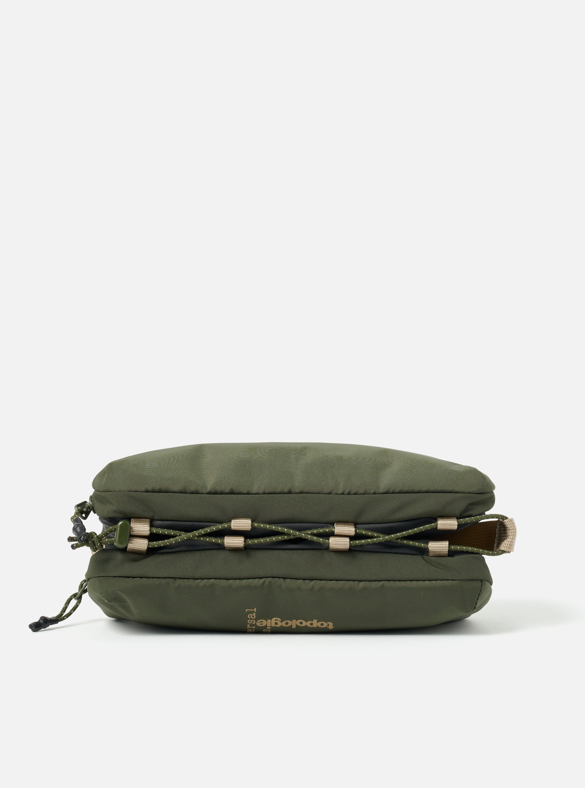 Topologie x Universal Works Rifle Green UW Tech Bottle Sacoche Medium on a white background. The bag is olive green with a rope detail.