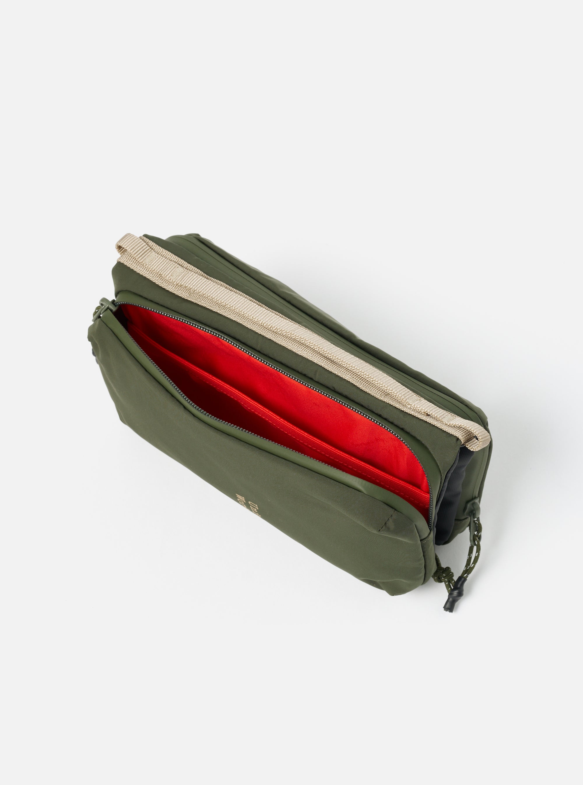 Topologie x Universal Works Rifle Green UW Tech Bottle Sacoche Medium, rifle green with beige strap, red interior. Studio shot on white background.