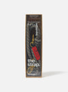 Topologie x Universal Works Red Hitch UW Rope 8mm Rope Strap in its packaging. The rope is blue, brown and white. The packaging is clear with brown edges. 