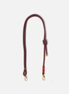 Topologie x Universal Works Olive Hitch UW Rope 8mm Strap on a white background. The rope is red and navy with gold hardware.