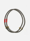 Topologie x Universal Works Olive Hitch UW Rope 10mm Rope Loop on a white background. The rope is olive with blue and tan accents and has red fabric and gold metal details.