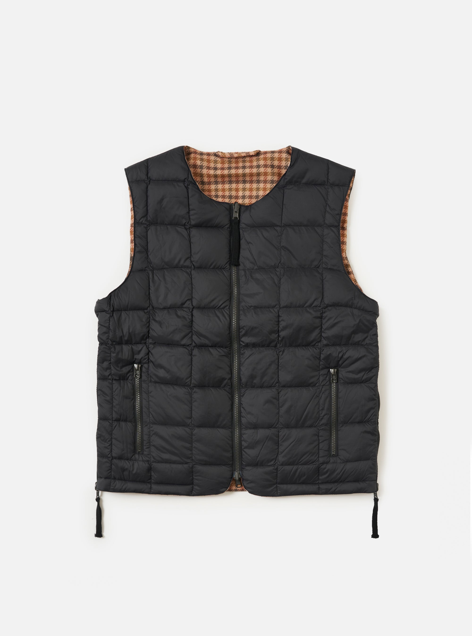 The TAION x Universal Works Reversible Black Military Line Vest on a white background. The vest is black with a brown and tan houndstooth pattern visible on the inside.