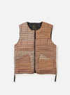 The TAION x Universal Works Reversible Black Military Line Vest is displayed on a white background. The vest features a brown and beige houndstooth pattern and black trim.