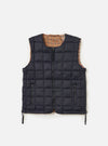 The TAION x Universal Works Reversible Dark Navy Military Line Vest on a white background. The vest is dark navy with a brown and tan houndstooth pattern on the reverse side.