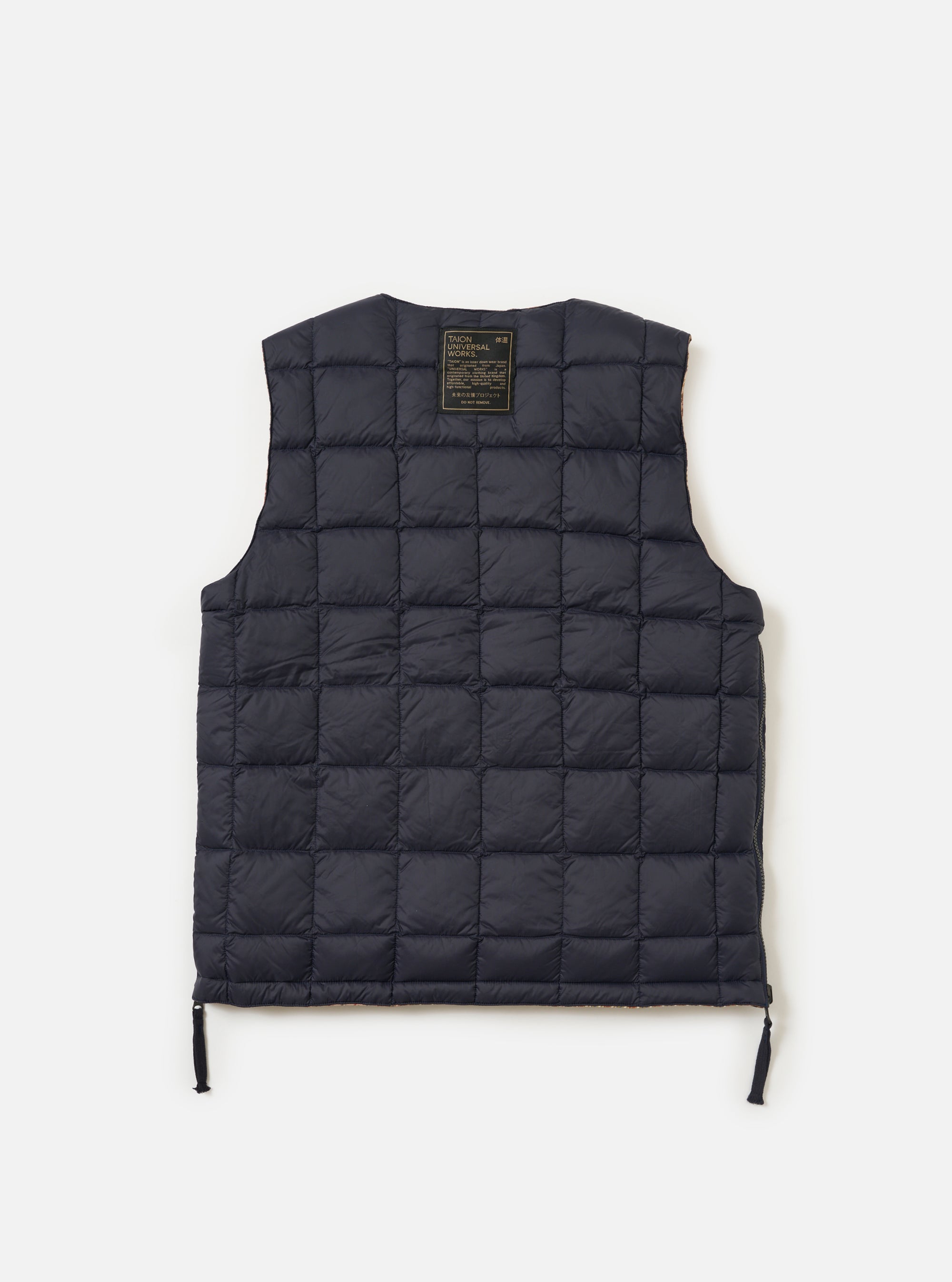 TAION x Universal Works Reversible Dark Navy Military Line Vest on a white background. Close-up shows the quilted texture and reversible design. 