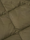 Close-up of the TAION x Universal Works Reversible Dark Olive Military Line Vest. Shows the dark olive quilted material and stitching.